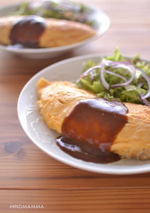A picture of Cheesy Omurice with Leftover Curry.