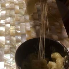 A picture of Mac n Cheese in a Mug.