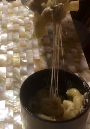 A picture of Mac n Cheese in a Mug.