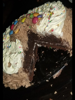 A picture of Simple moist chocolate cake with butter icing frosting.