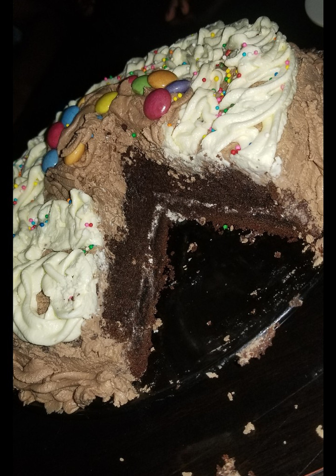 A picture of Simple moist chocolate cake with butter icing frosting.