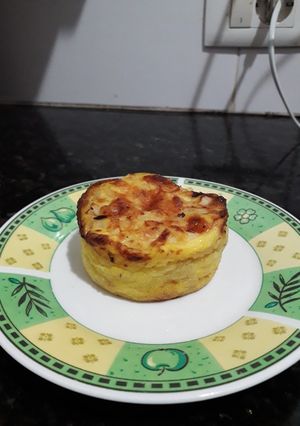 Una foto de Mini soufflé de cebolla y queso