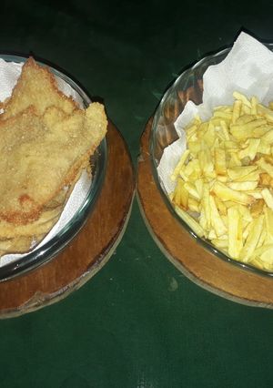 Una foto de Supremas con papas fritas