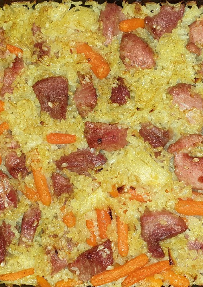 Una foto de Arroz al horno con pavo y curry