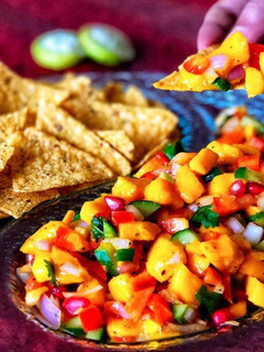 A picture of Mango salsa with nachos.