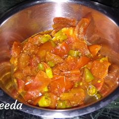 A picture of Tomato green chilli veg.