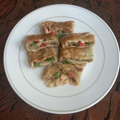 A picture of Veg omelette 🫑 🥕🫑.