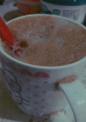 Una foto de Café con leche espumoso
