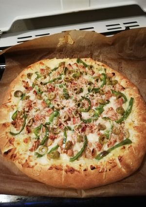 صورة لوصفة بيتزا شهيه بالصلصه جبن 🍕