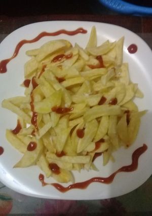 A picture of Home made chips/fries.