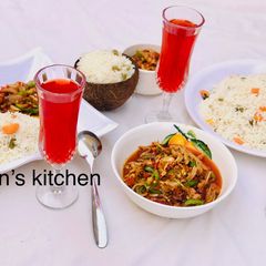 A picture of Coconut rice with shredded chicken.