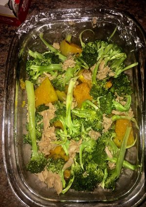 A picture of Broccoli, pumpkin and tuna salad.