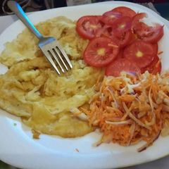 A picture of Omelette with salad.