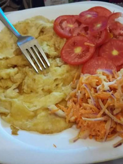 A picture of Omelette with salad.