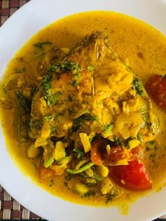 A picture of Fish in curd gravy (sorse diye doi mach).