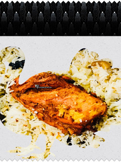 A picture of Kashmiri pulao with grilled chicken.