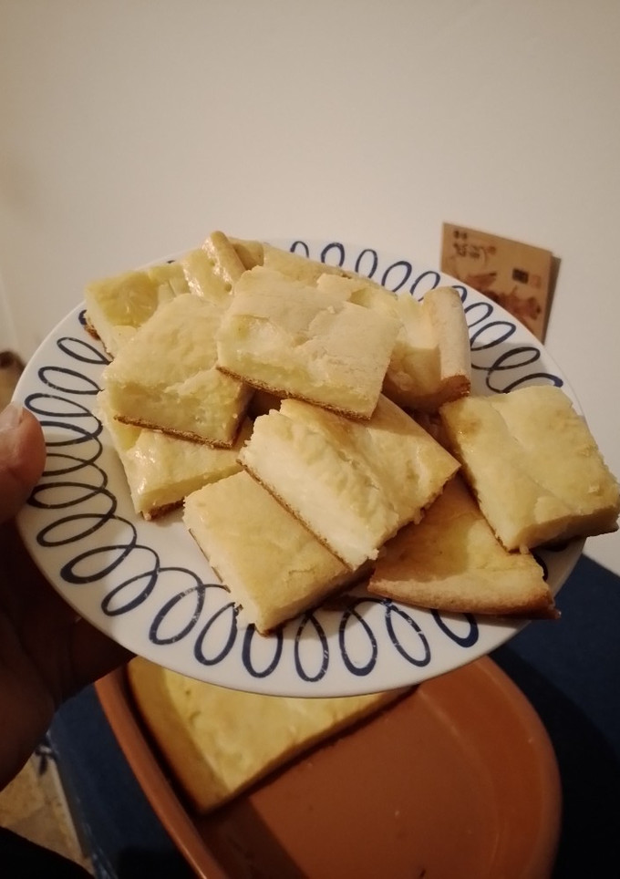 Una foto de Fainá de queso 🧀 con piso crocante!