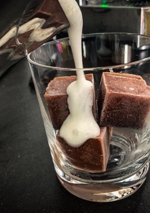 A picture of Chocolate milk ice cubes with frothed milk [Ideal for kids].