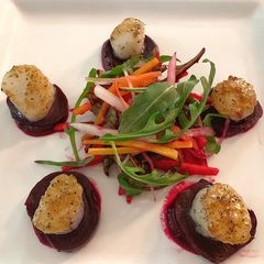 A picture of Seared Scallops with Beet Vinaigrette.