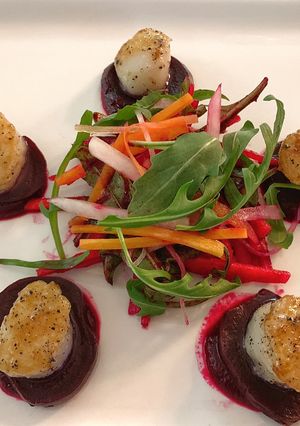 A picture of Seared Scallops with Beet Vinaigrette.
