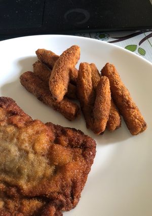 Una foto de Papas rústicas rebozadas