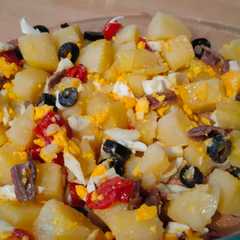 Una foto de Ensalada de patata, anchoas y pimientos del piquillo