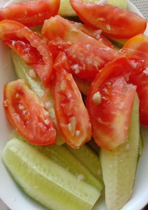 A picture of Cucumber tomato Salad.