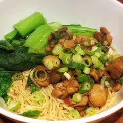 Indonesian Chinese style dry noodle with chicken and mushroom A picture of Indonesian Chinese style dry noodle with chicken and mushroom.