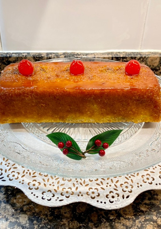 Una foto de Budín de coco, relleno de dulce de leche