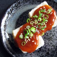 A picture of Agedashi Tofu with Gochujang Sauce.