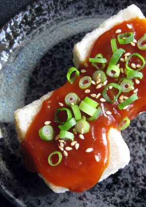 A picture of Agedashi Tofu with Gochujang Sauce.
