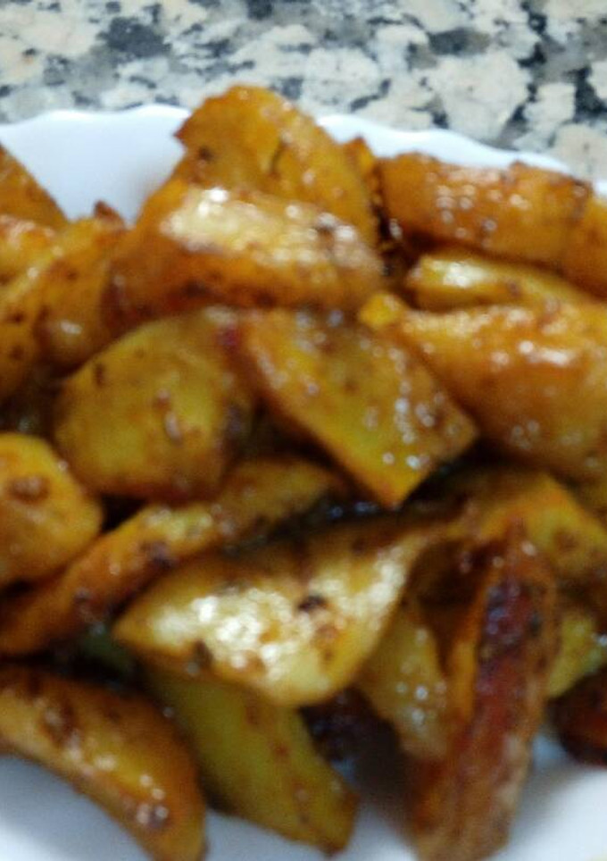 Una foto de Patatas asadas cajún