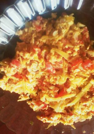 A picture of A mix of cabbage and scrambled eggs.