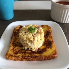 A picture of French toast topping with egg mayo.