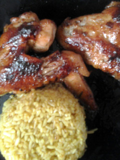 A picture of chicken wings with honey garlic marinade sauce.