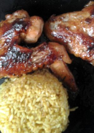 A picture of chicken wings with honey garlic marinade sauce.