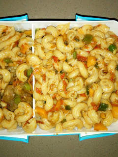 A picture of Macaroni with veggies.