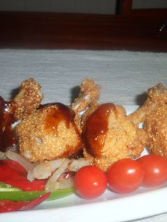 Una foto de Alitas de pollo con salsa barbacoa 