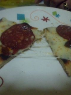 Una foto de Pizza frita con longaniza