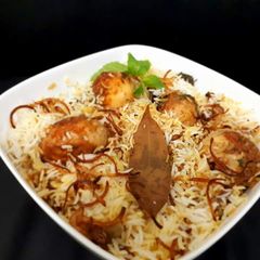 A picture of Egg dum biryani.