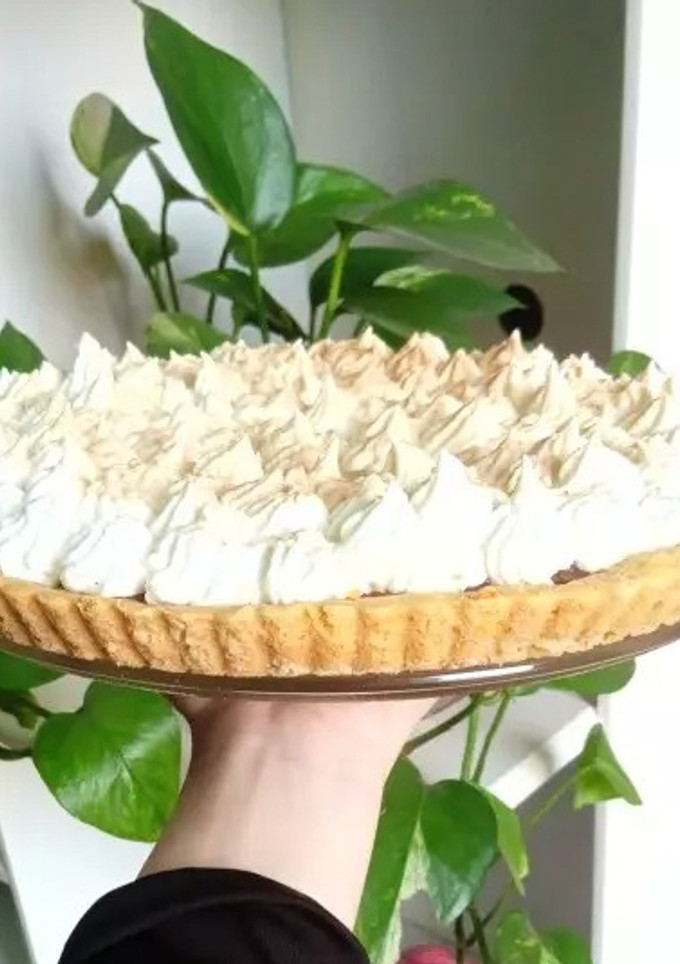 Una foto de Tarta de dulce de leche y merengue
