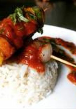 A picture of Cottage cheese shaslik with butter garlic rice.