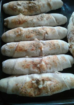 Una foto de Pizza enrollada (pan relleno)