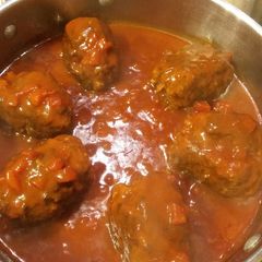 A picture of Beef Croquettes in Tomato Gravy.