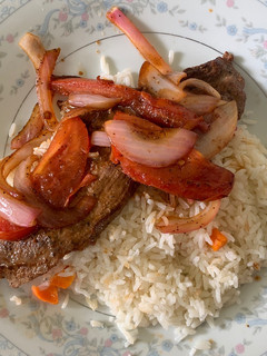 Una foto de Bistec encebollado