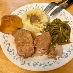 A picture of Crockpot Pork Chops with Onion Gravy.