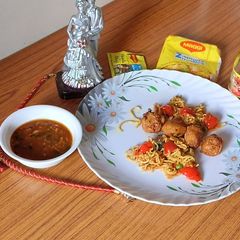 Maggie uttapam with Maggi manchurian A picture of Maggie uttapam with Maggi manchurian.