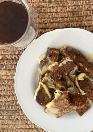 A picture of Rye bread with brie and honey.