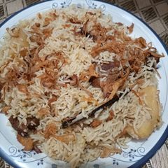 A picture of Beef pulao with methi ark -e- gulaab😋.