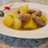 Patatas guisadas con salchichas frescas al curry